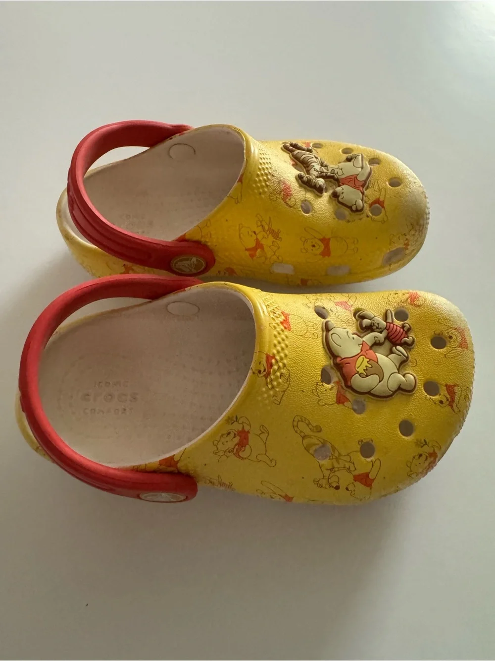 CROCS Kids Yellow Clogs with Red Heel Straps - Winnie the Pooh Theme